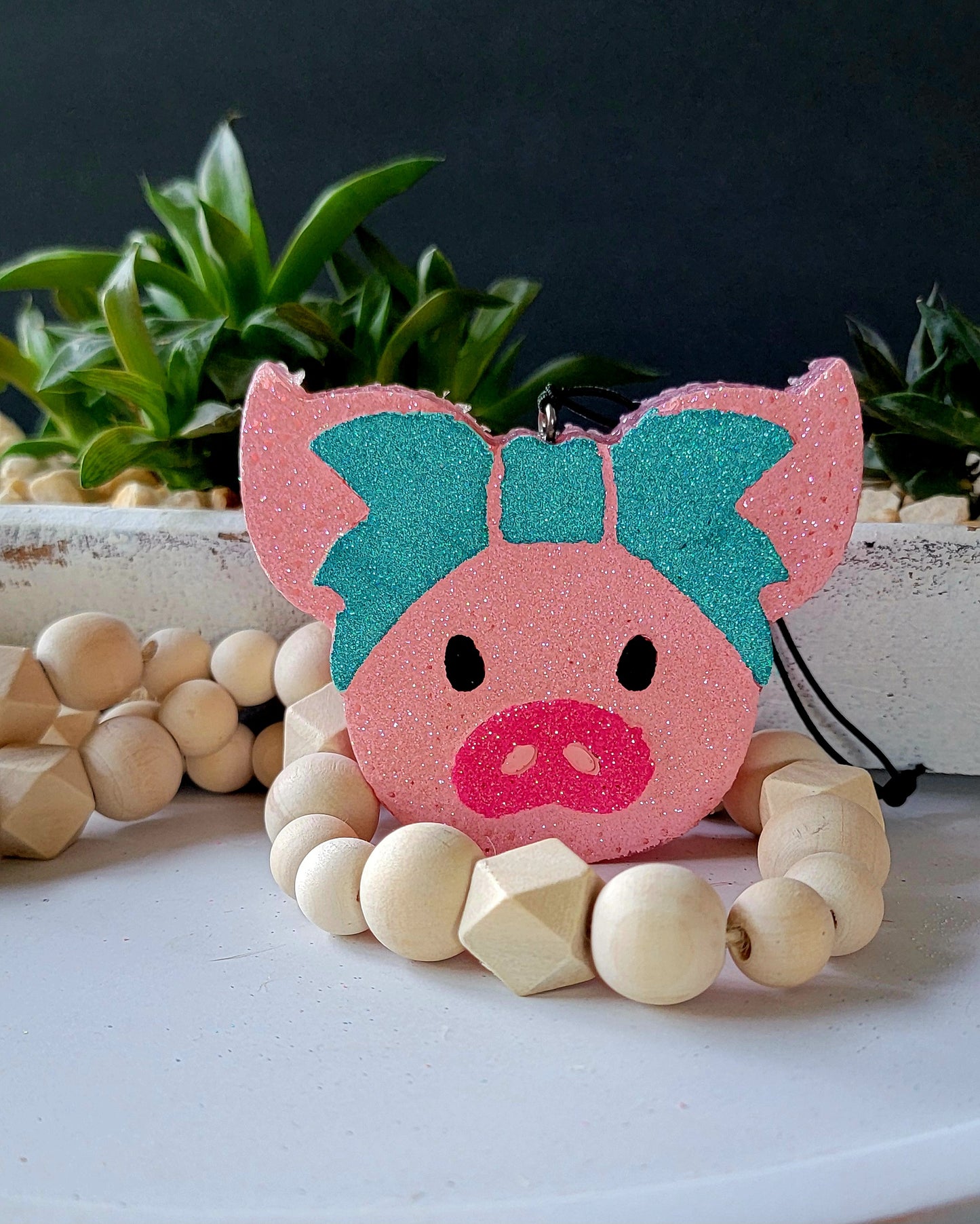 Pig with bow