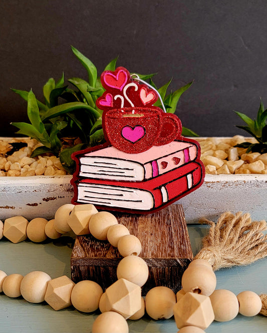 Coffee mug with book stack
